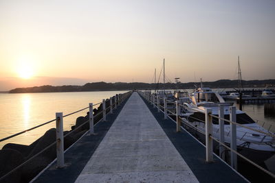 View of pier at sunset