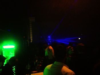 People enjoying music concert