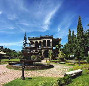 Built structure in garden against sky