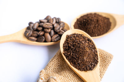 Close-up of coffee beans on table