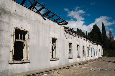 Low angle view of old building against sky