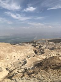 High angle view of arid landscape against sky