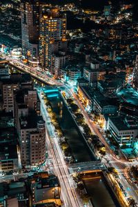 High angle view of illuminated cityscape at night