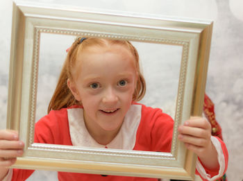 Portrait of cute girl playing