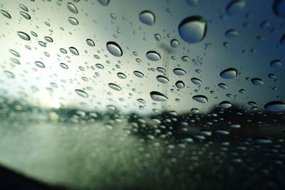 Full frame shot of wet window in rainy season