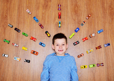 Portrait of boy playing with toy blocks on table