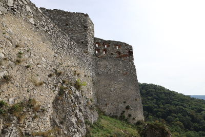 Low angle view of historic building against sky