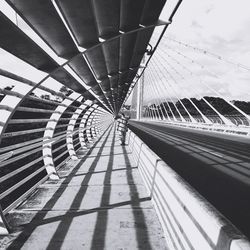 Low angle view of bridge in city