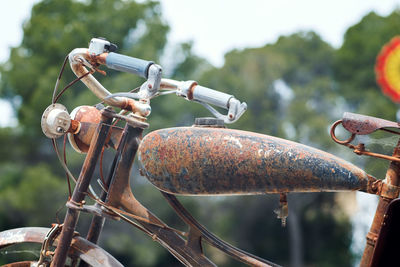 Close-up of rusty motorcycle