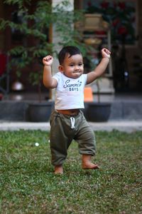 Boy playing in the garden