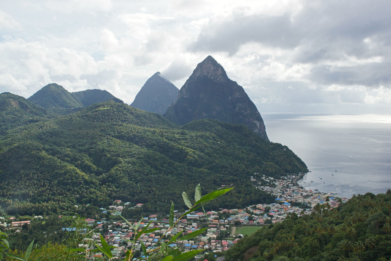 SCENIC VIEW OF MOUNTAIN AGAINST CLOUDY SKY