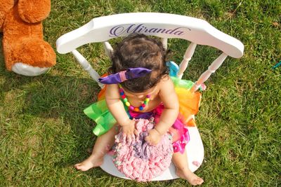 High angle view of girl playing on field