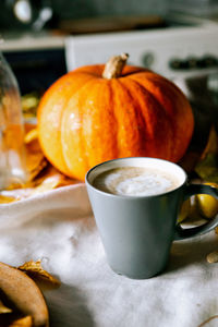 Close-up of coffee cup on table