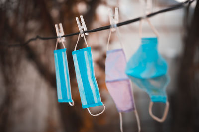 Close-up of clothes hanging on clothesline