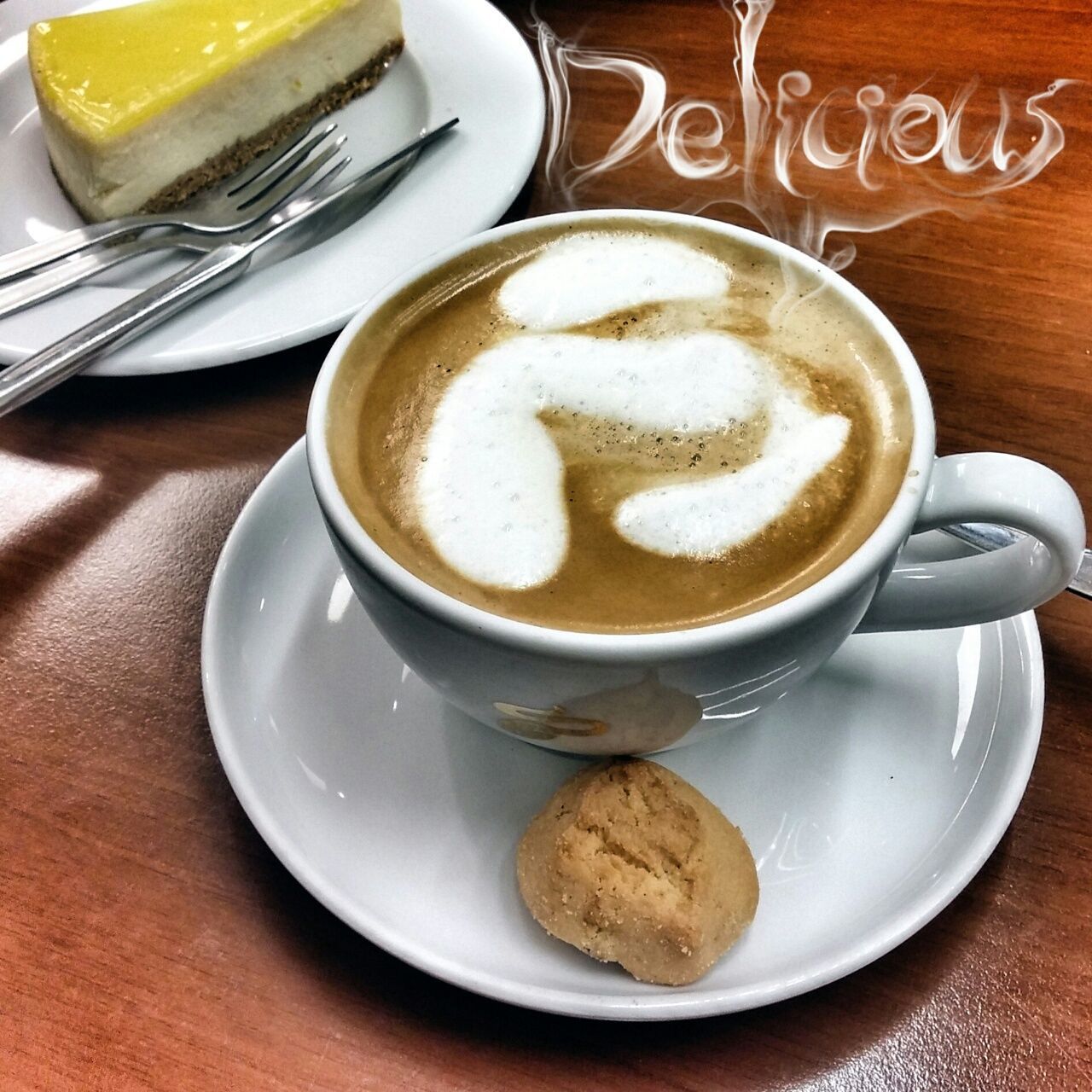 food and drink, coffee cup, coffee - drink, drink, saucer, refreshment, freshness, table, indoors, cappuccino, frothy drink, coffee, froth art, still life, cup, spoon, close-up, high angle view, breakfast, latte