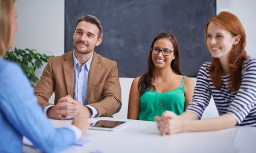 Business colleagues working at office