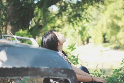 Rear view of woman in car