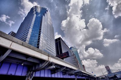 Low angle view of skyscrapers against sky