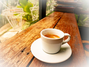 Close-up of coffee cup on table