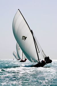 Boats sailing in sea