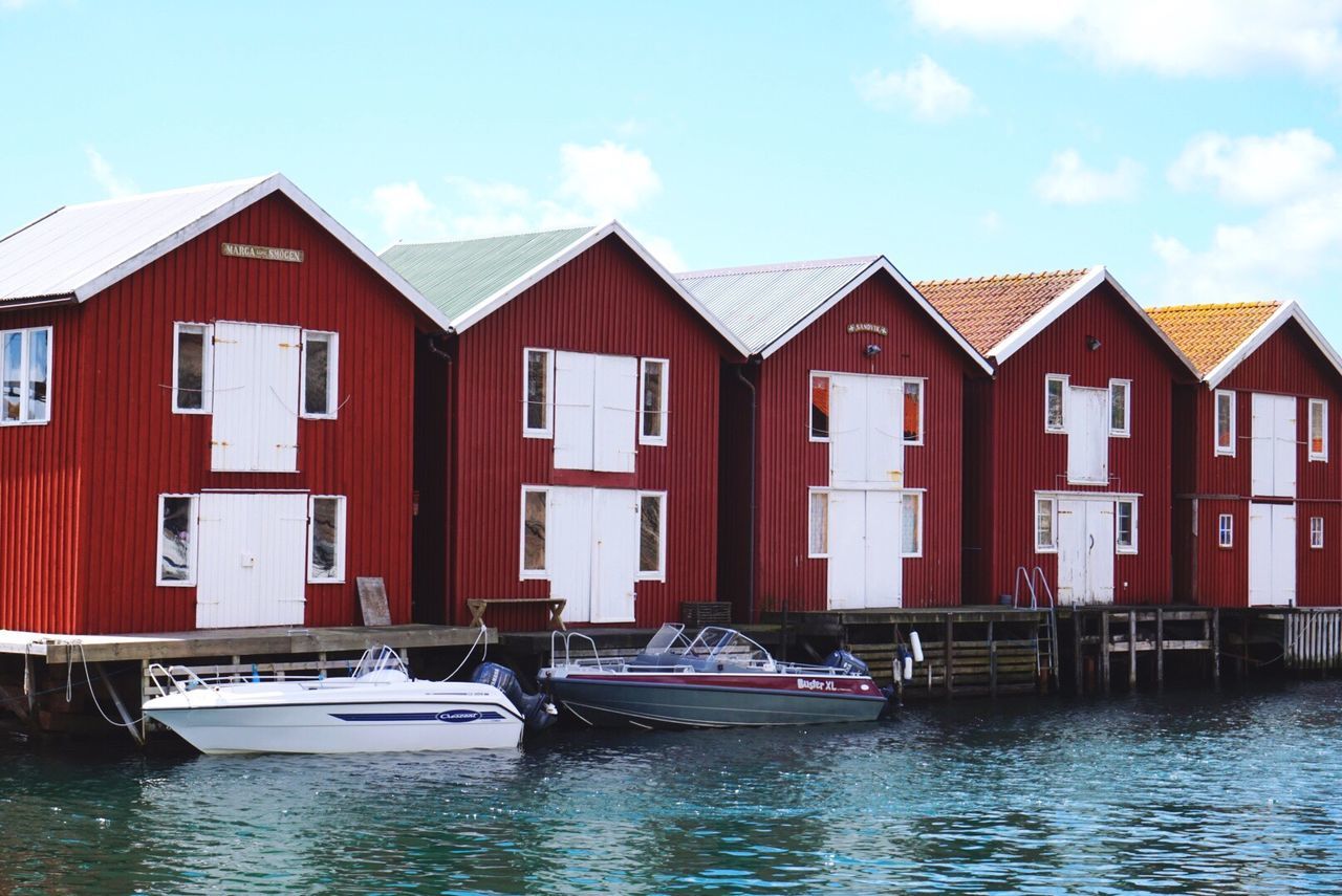 water, built structure, waterfront, architecture, sky, building exterior, nautical vessel, boat, sea, transportation, cloud, moored, day, rippled, cloud - sky, house, outdoors, mode of transport, no people, in a row