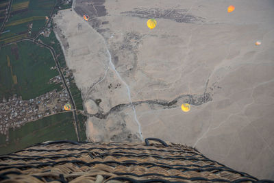 High angle view of airplane flying over landscape