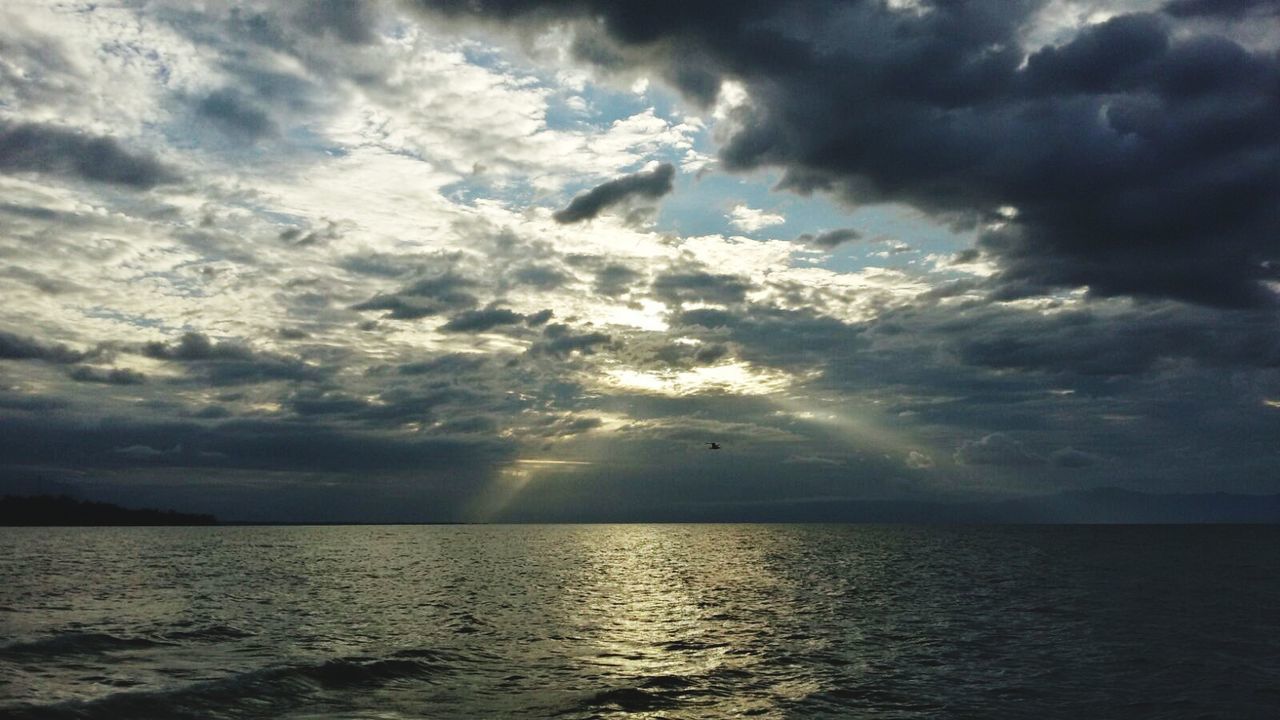 scenics, cloud - sky, sea, sky, horizon over water, beauty in nature, nature, water, idyllic, tranquility, outdoors, tranquil scene, sunset, awe, no people, dramatic sky, sunbeam, day