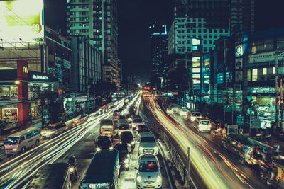 Light trails on city street at night