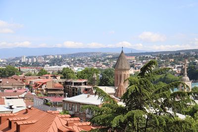 High angle view of townscape against sky in city