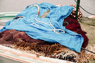 Fishing ropes in boat sailing over sea