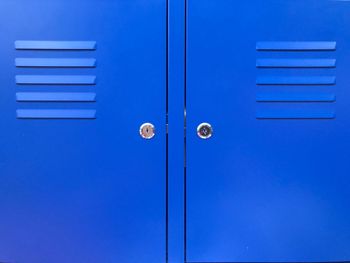 Close-up of closed blue locker