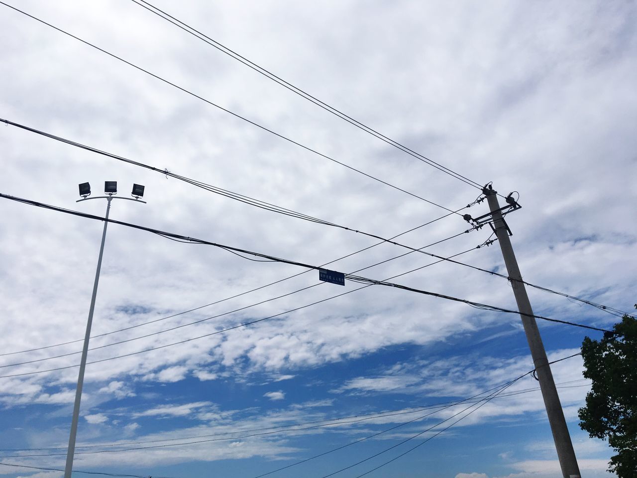 cable, cloud - sky, power line, power supply, low angle view, sky, connection, electricity, technology, fuel and power generation, electricity pylon, day, no people, outdoors, telephone line, nature, bird