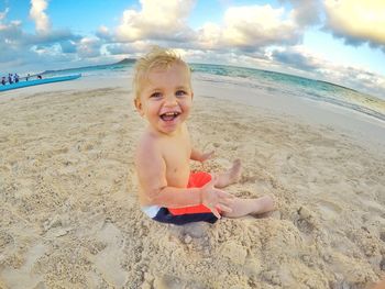 Portrait of happy boy on beach