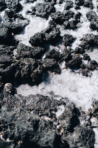 Full frame shot of rock at sea