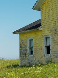 House on field against sky