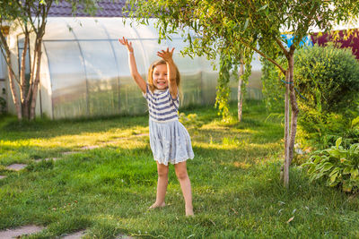 Full length of a girl in grass