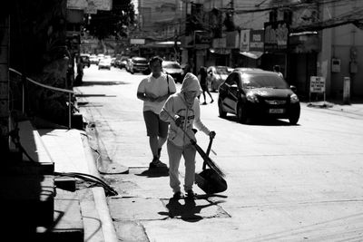 View of people walking on street