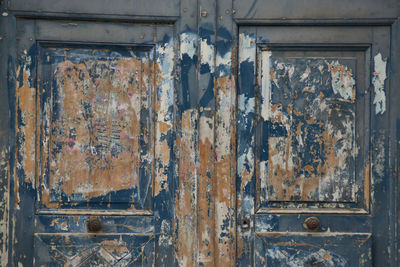Full frame shot of old abandoned door