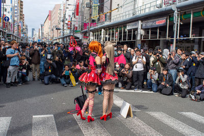 People on street in city