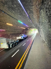 Light trails on road in tunnel