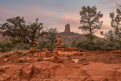 Scenic view of desert against sky during sunset