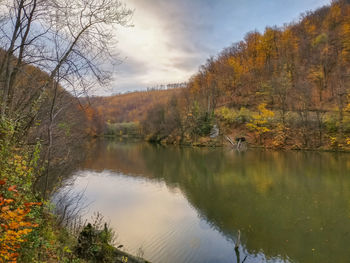 Scenic view of lake against sky during autumn