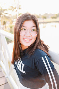 Portrait of smiling young woman