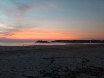 Scenic view of sea at sunset