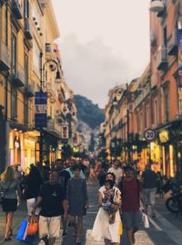 People walking on street in city