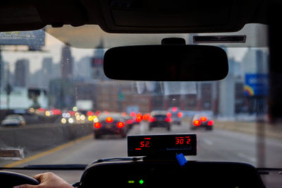 Road signal seen through car windshield