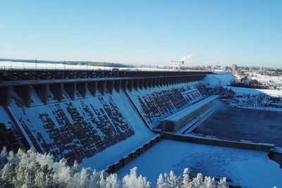 High angle view of dam by river against sky