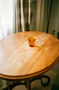 Close-up of empty chairs and table at home