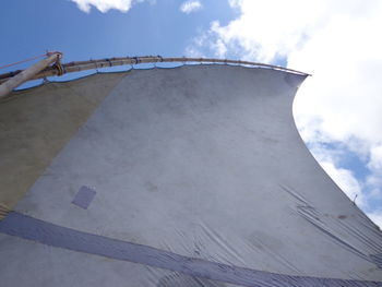 Low angle view of boat mast against sky