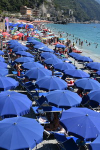 High angle view of people relaxing on beach